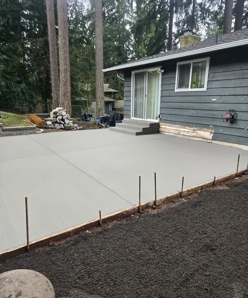 Retaining Wall, New Lawn Installation, & Patio Concrete in Redmond 